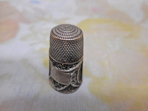 SOLD……An early 19th century silver filigree thimble.