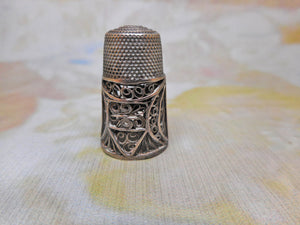 SOLD……An early 19th century silver filigree thimble.