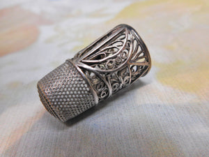 SOLD……An early 19th century silver filigree thimble.