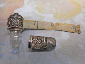 A silver filigree tape / thimble/ scent combination piece. c1815