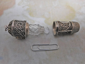 A silver filigree tape / thimble/ scent combination piece. c1815