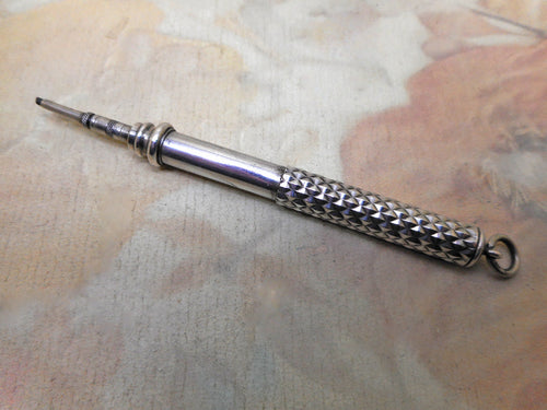 A silver extending, propelling pencil. c1890