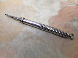 A silver extending, propelling pencil. c1890