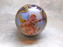 Load image into Gallery viewer, A Continental porcelain parasol handle painted with cherubs. c1880
