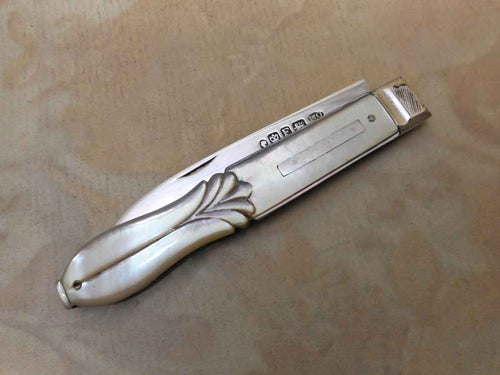 A mother of pearl folding fruit knife. Hall marked 1849.