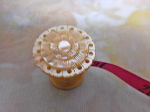 SOLD......A pearl topped tape measure.* replacement printed silk ribbon*. c1850