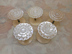 A set of five mother of pearl topped reels / spools. c 1850