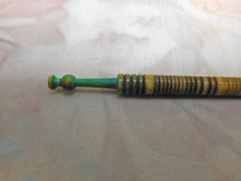 Load image into Gallery viewer, A dyed green 19th century lace bobbin.
