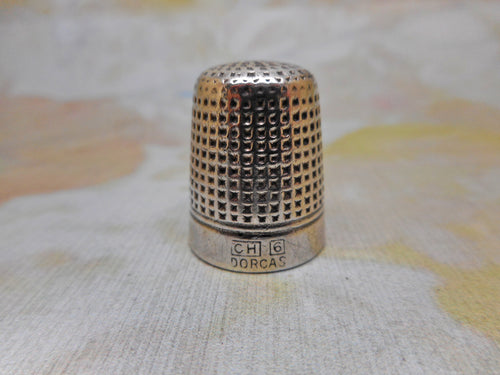 A Charles Horner 'Dorcas' thimble. Adult size 6. c1920