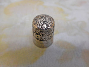 A decorative 'Little Dorcas' thimble. c1910
