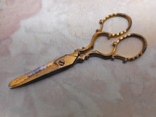 Load image into Gallery viewer, SOLD……Three pearl handled sewing tools with matching gilded steel scissors. c 1840
