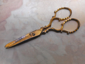 SOLD……Three pearl handled sewing tools with matching gilded steel scissors. c 1840