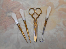 Load image into Gallery viewer, Three pearl and gilt hand tools and matching scissors. c 1840
