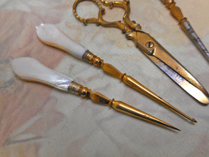 SOLD……Three pearl handled sewing tools with matching gilded steel scissors. c 1840