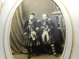 An antique Tartan ware photo album.