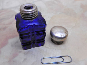 SOLD…… cut glass scent bottle with a silver lid. c 1900