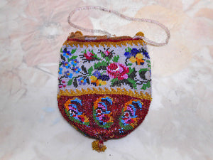 An antique Berlin patterned bead work purse. c1850