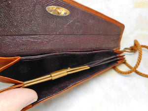 SOLD……A tooled leather 'fan' shaped purse. Polish spa town. c1900