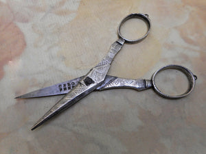 An 18th century pair of scissors with a shagreen sheath. a/f