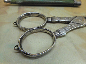 An 18th century pair of scissors with a shagreen sheath. a/f