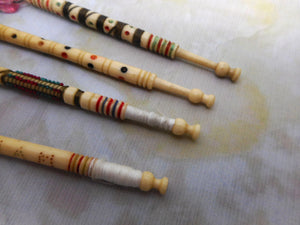 SOLD.....Four decorated 19th century bone lace bobbins.