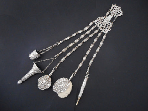 A decorative 5 chain silver plated chatelaine. c 1870