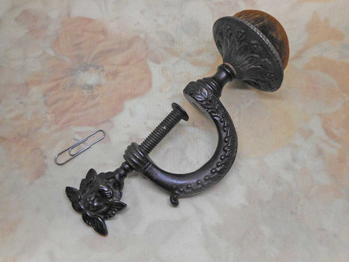 An antique cast iron pin cushion clamp. c 1860