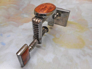 SOLD……A stone set, steel pin cushion clamp. German. c1880