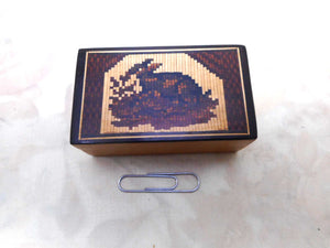 A small Tunbridge Ware needle packet box inlaid with a rabbit. c 1840