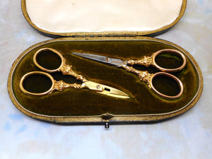 SOLD……Two pairs of 9 carat gold handled scissors. HM. 1898