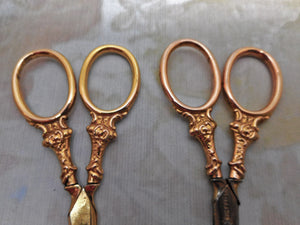 SOLD……Two pairs of 9 carat gold handled scissors. HM. 1898