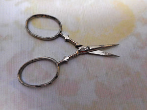 A small pair of steel scissors from a Palais Royal piano sewing box. c 1800