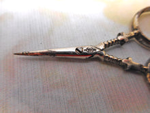 Load image into Gallery viewer, A small pair of steel scissors from a Palais Royal piano sewing box. c 1800
