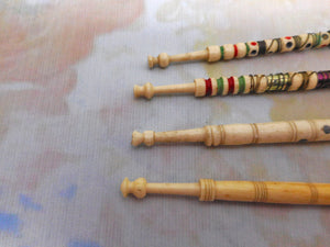 Four decorative mutton bone lace bobbins. 19thc