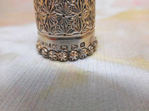 SOLD...........A silver thimble with star border. Chester 1899.