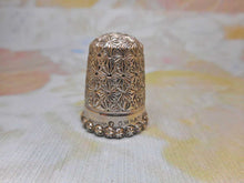 Load image into Gallery viewer, A silver thimble with star border. Chester 1899.
