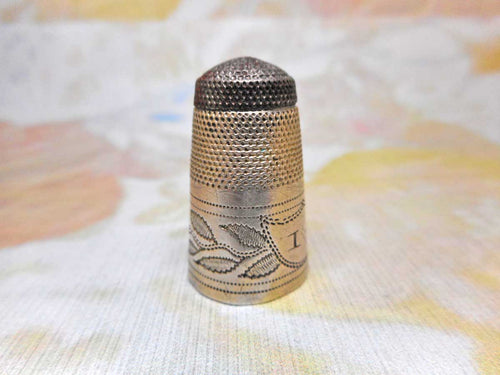 A Georgian steel topped silver thimble. c 1790