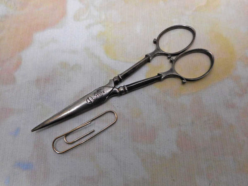 A pair of 19th century steel sewing scissors. Elite.