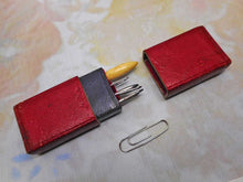 Load image into Gallery viewer, A crochet hook set in a red leather case. c 1850

