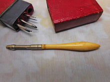 Load image into Gallery viewer, SOLD…..       A crochet hook set in a red leather case. c 1850
