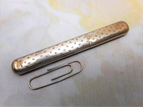 A French silver gilt needle case. c1860