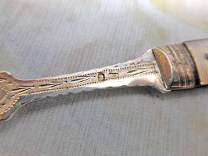 SOLD……An engraved mother pf pearl folding fruit fork. c 1800