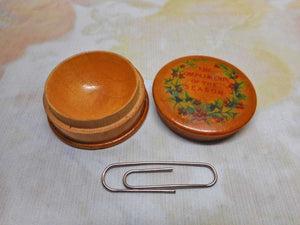 A small Mauchline Ware pot. Christmas theme.