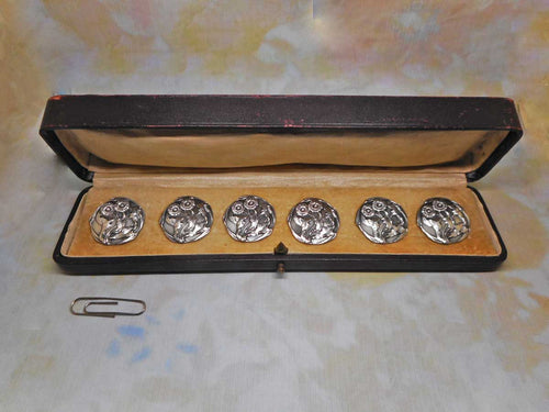 A set of 6 sterling silver buttons. c 1890-1910