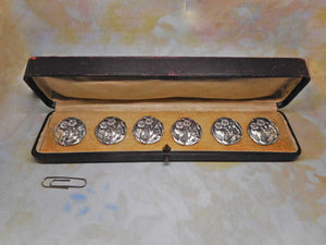 A set of 6 sterling silver buttons. c 1890-1910