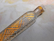 Load image into Gallery viewer, A small glass tear catcher scent bottle with gilding. Late Victorian.
