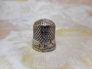 SOLD…….A late 17th century silver thimble. Maker AP conjoined.