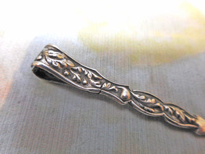 SOLD........A small silver earspoon and tweezer combo. c 1830-`1840