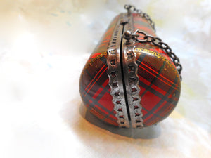 A Tartan Ware bag form sewing etui. c1860. Stuart.