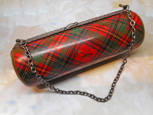 A Tartan Ware bag form sewing etui with a few tools. c 1860